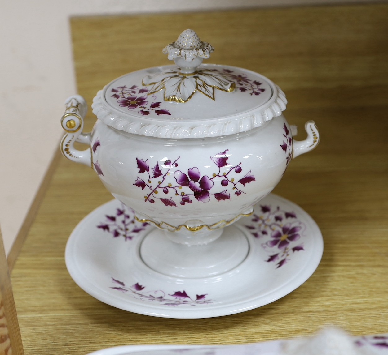 A Flight Barr and Barr floral and gilt decorated part dinner service